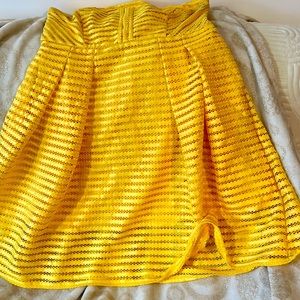 This was worn one time to a beach wedding and in a closet ever since like new.